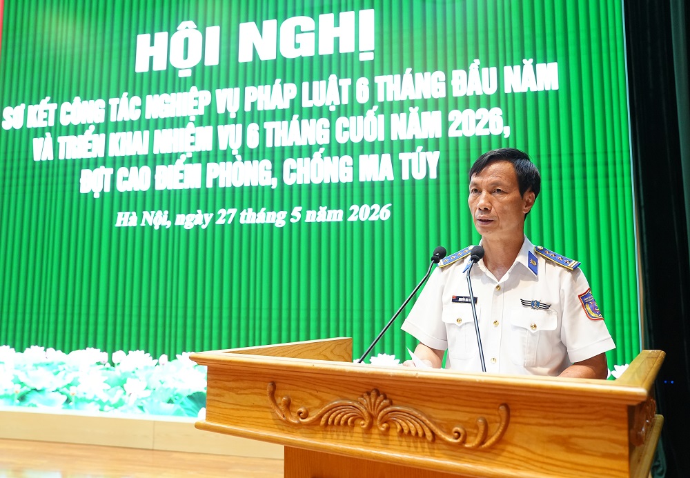 Đại tá nguyễn văn thiện cục trưởng cục nghiệp vụ và pháp luật cảnh sát biển việt nam báo cáo kết quả công tác nghiệp vụ pháp luật 6 tháng đầu năm 2026.